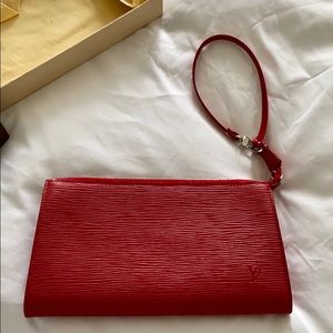 Red Louis Vuitton clutch